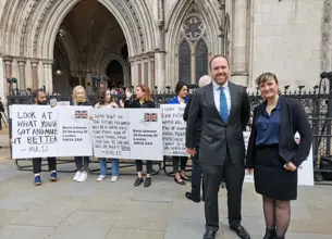 ClientEarth lawyers Sam Hunter-Jones and Sophie Marjanac outside the High Court on the first day of the hearing